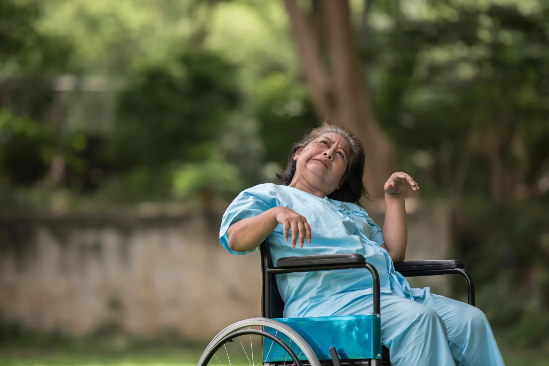 Person with cerebral palsy receiving support