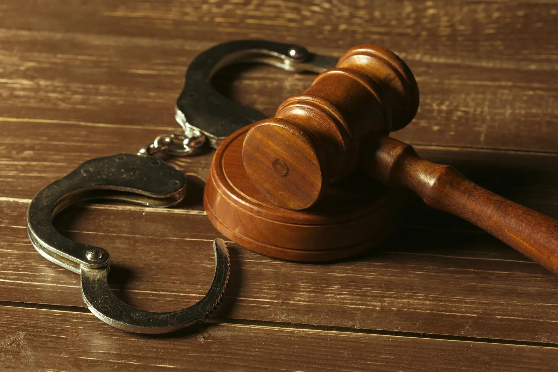 Gavel and handcuffs representing DBS checks and safeguarding