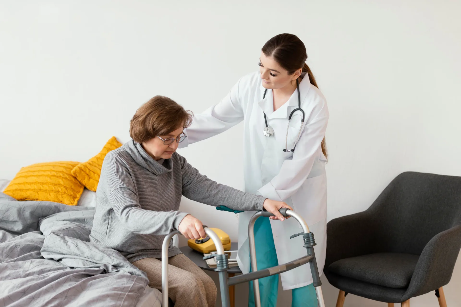 Care worker supporting an older person during respite care