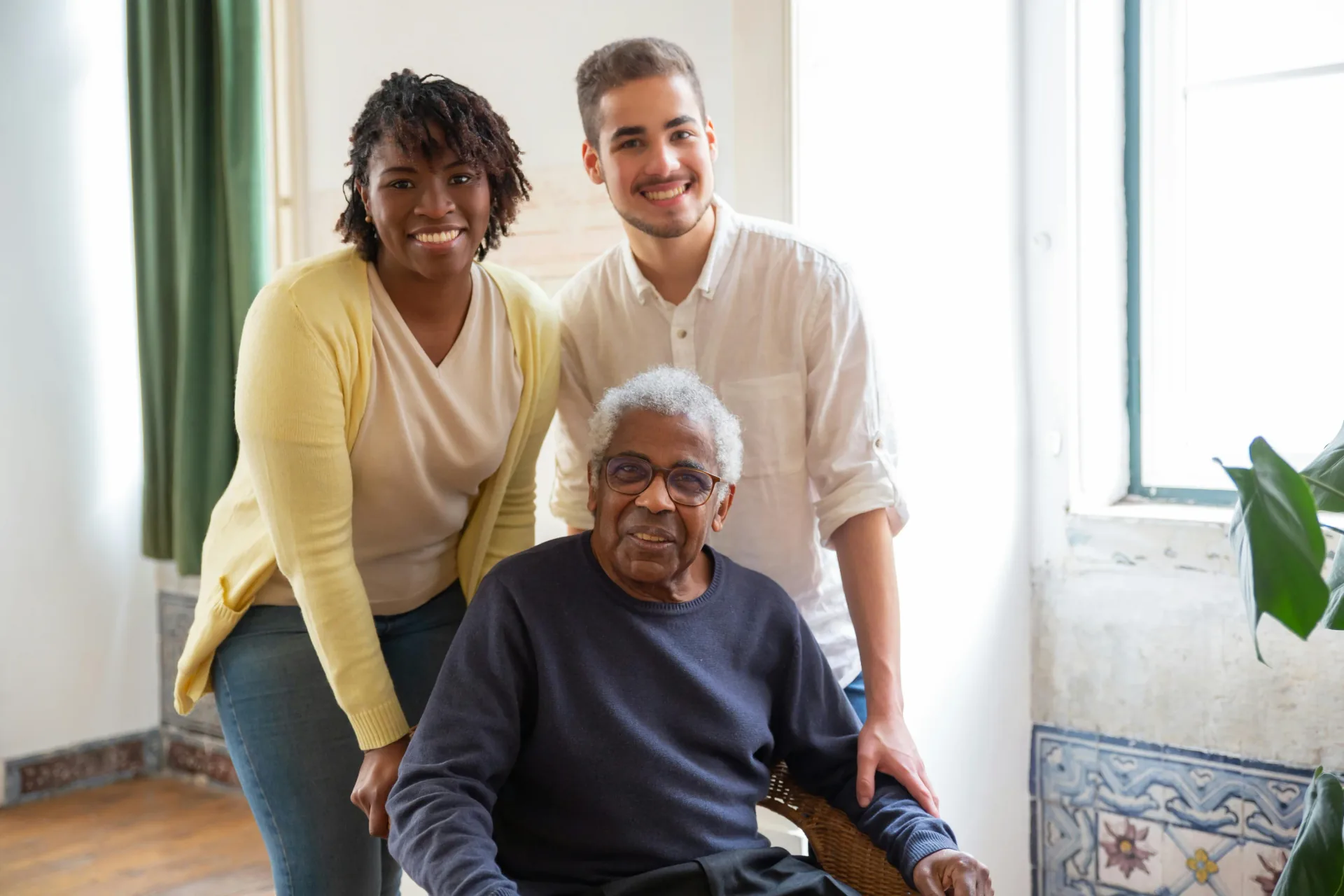 Family members supporting an older person at home