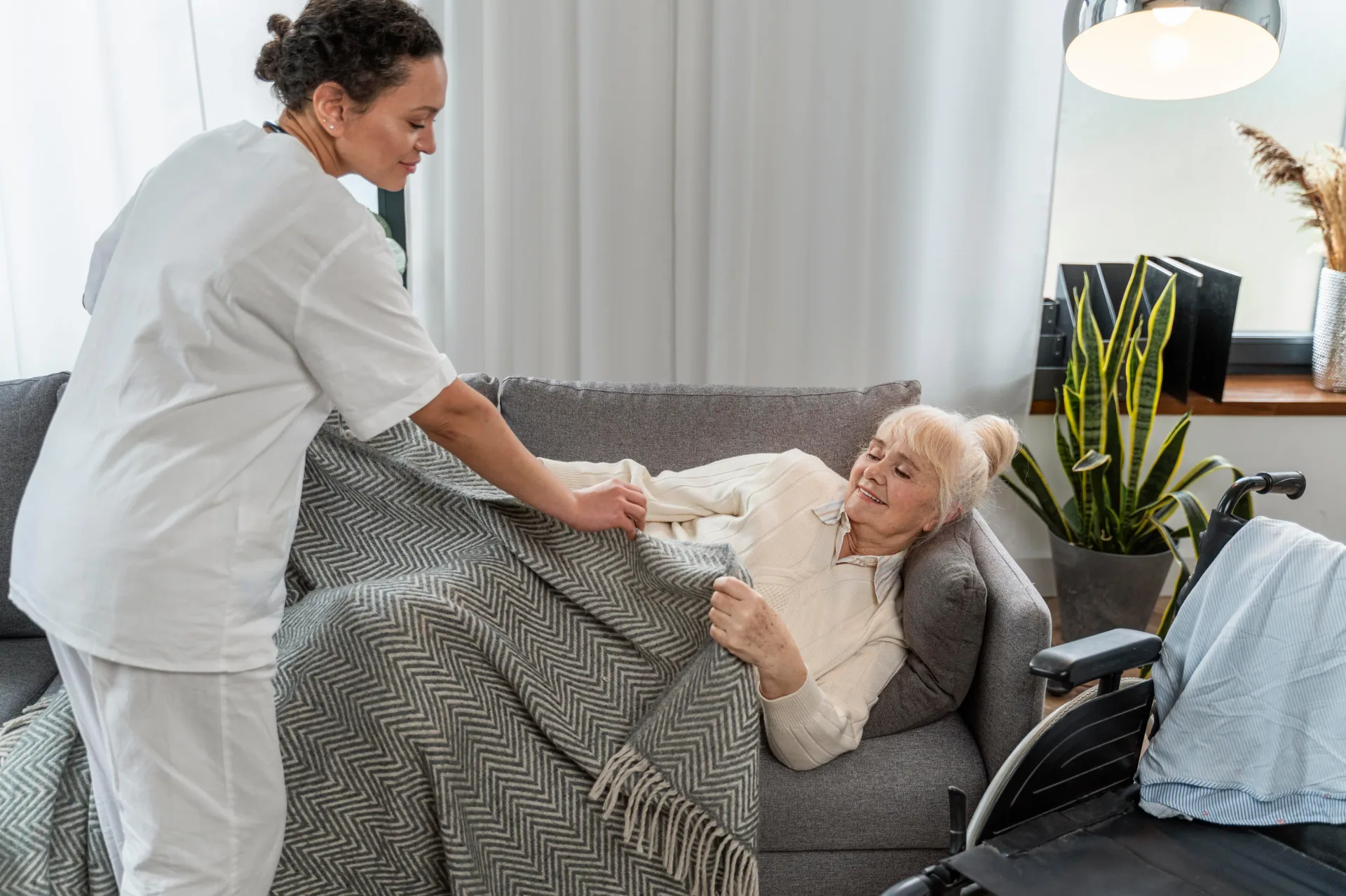 Care worker helping someone at home