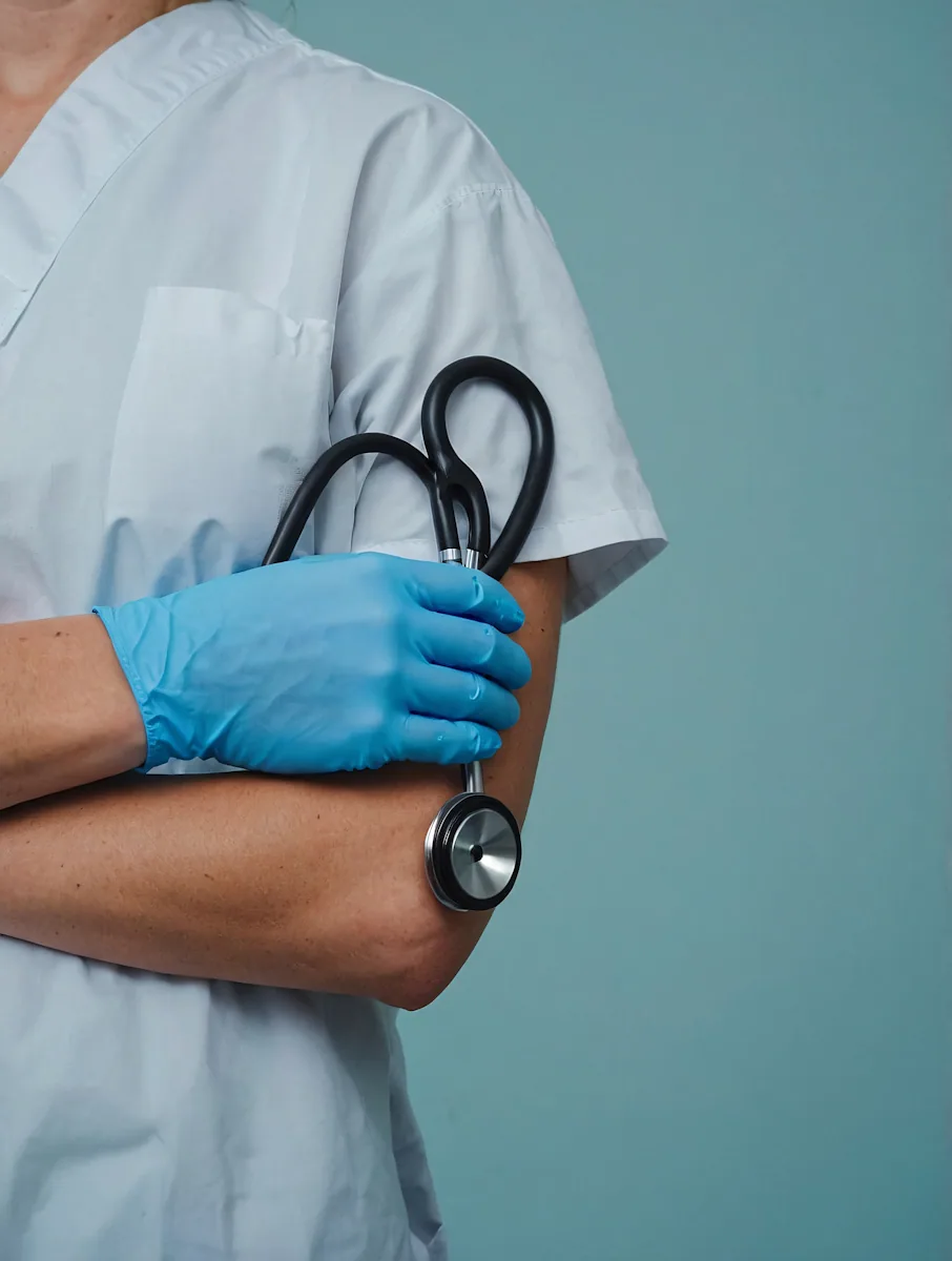 Healthcare professional holding a stethoscope