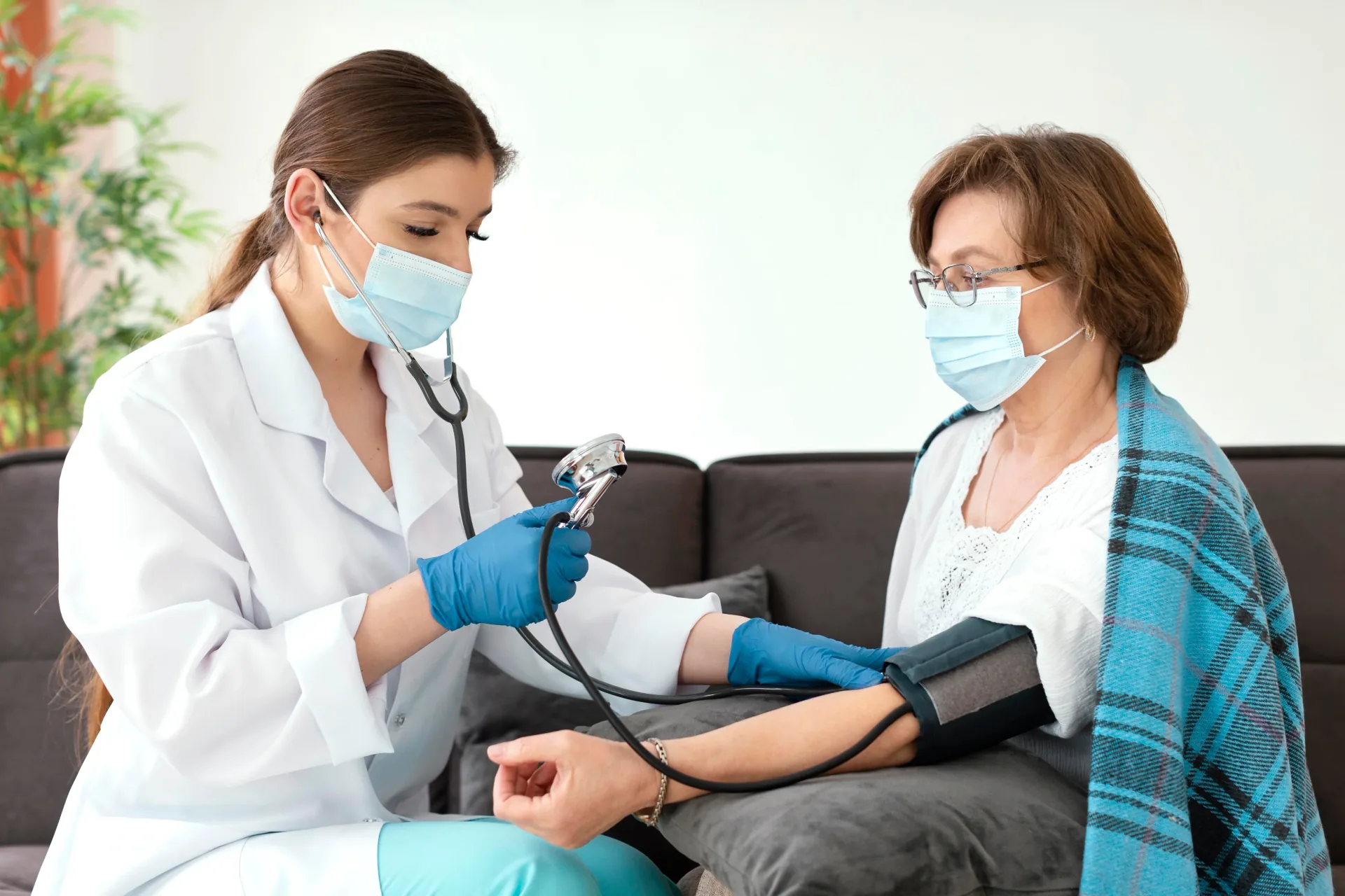 Healthcare professional speaking with an older woman about care needs
