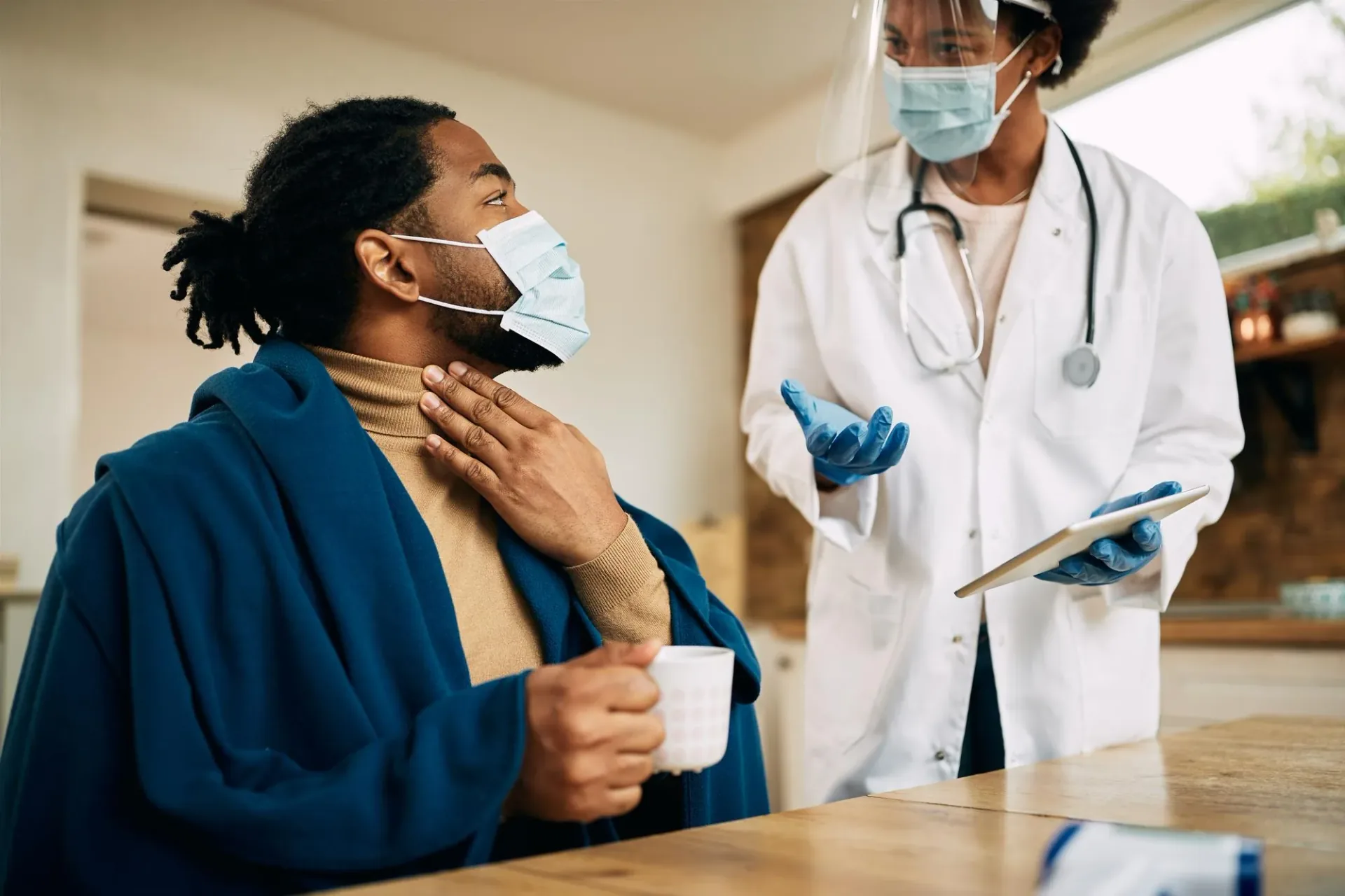 Healthcare professional discussing support during a referral appointment